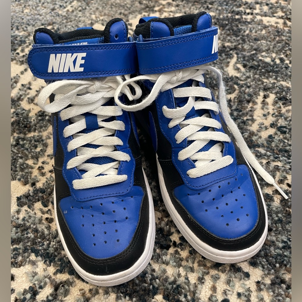 Blue and black hi top Nikes